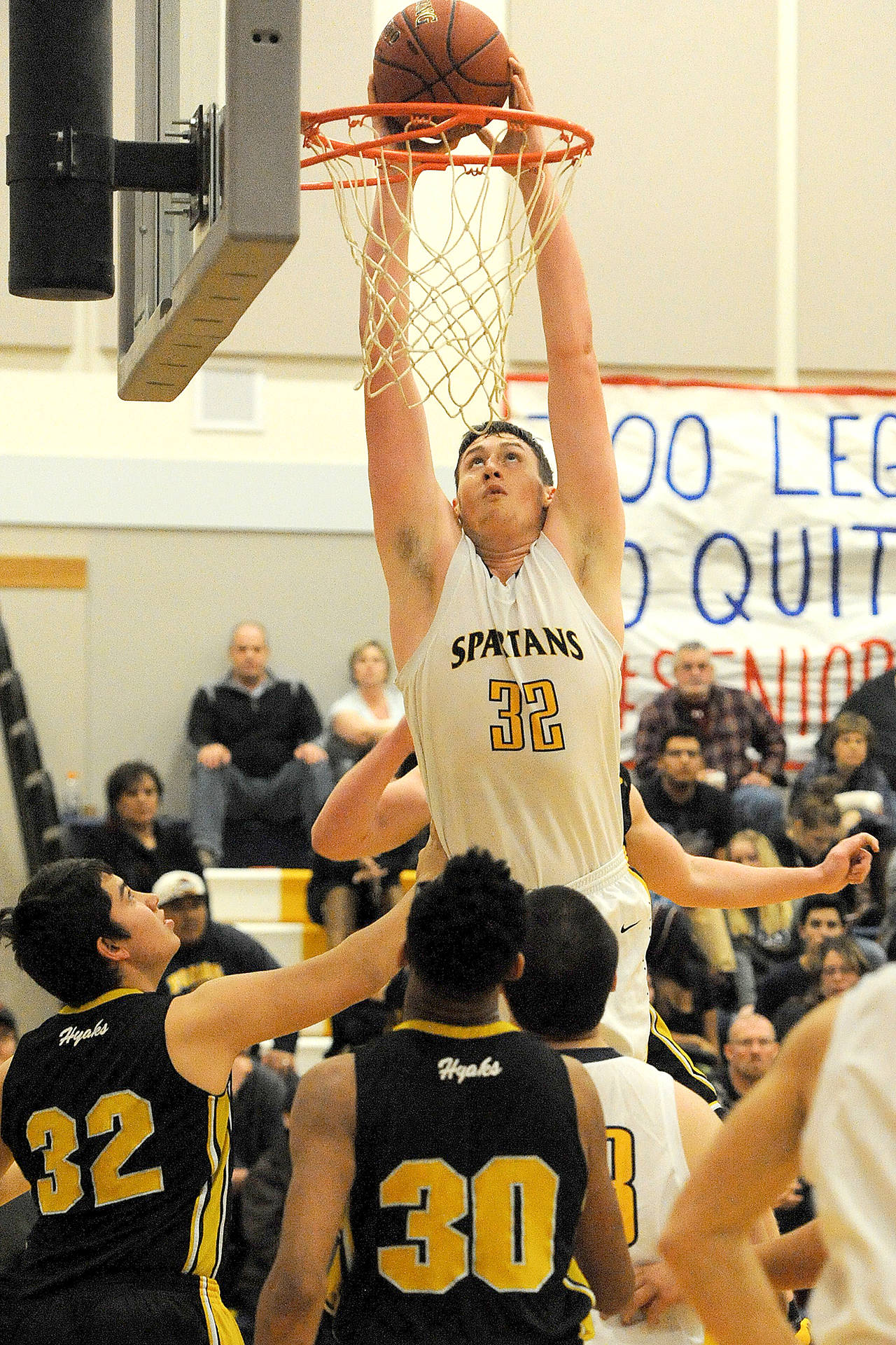 Lonnie Archibald/for Peninsula Daily News Forks’ Marky Adams sends home a two-hand slam dunk in a nonleague game against North Beach. Adams has been selected as the All-Peninsula Boys Basketball MVP in a vote of area coaches and the sports staff of the Peninsula Daily News.