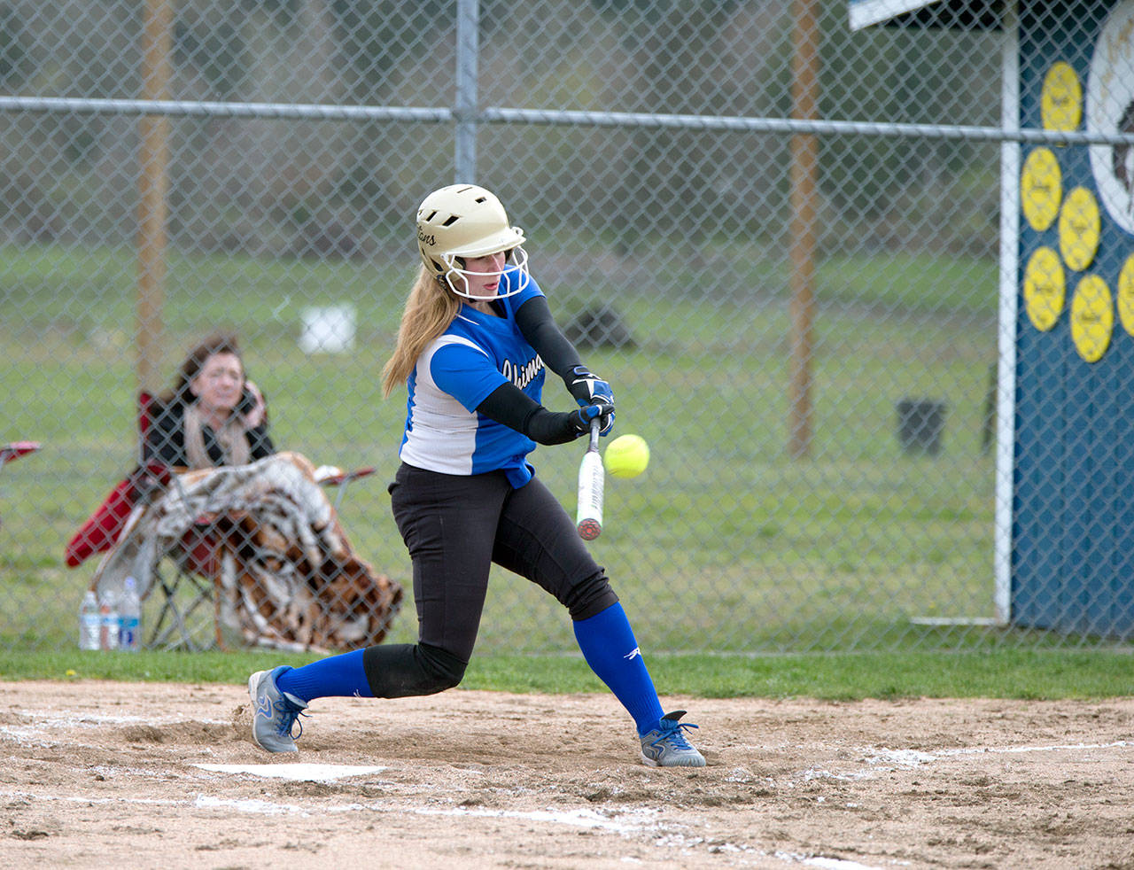 Steve Mullensky/for Peninsula Daily News Chimacum’s Bradyn Nelson drives in two runs with this triple in a game against rival Port Townsend.