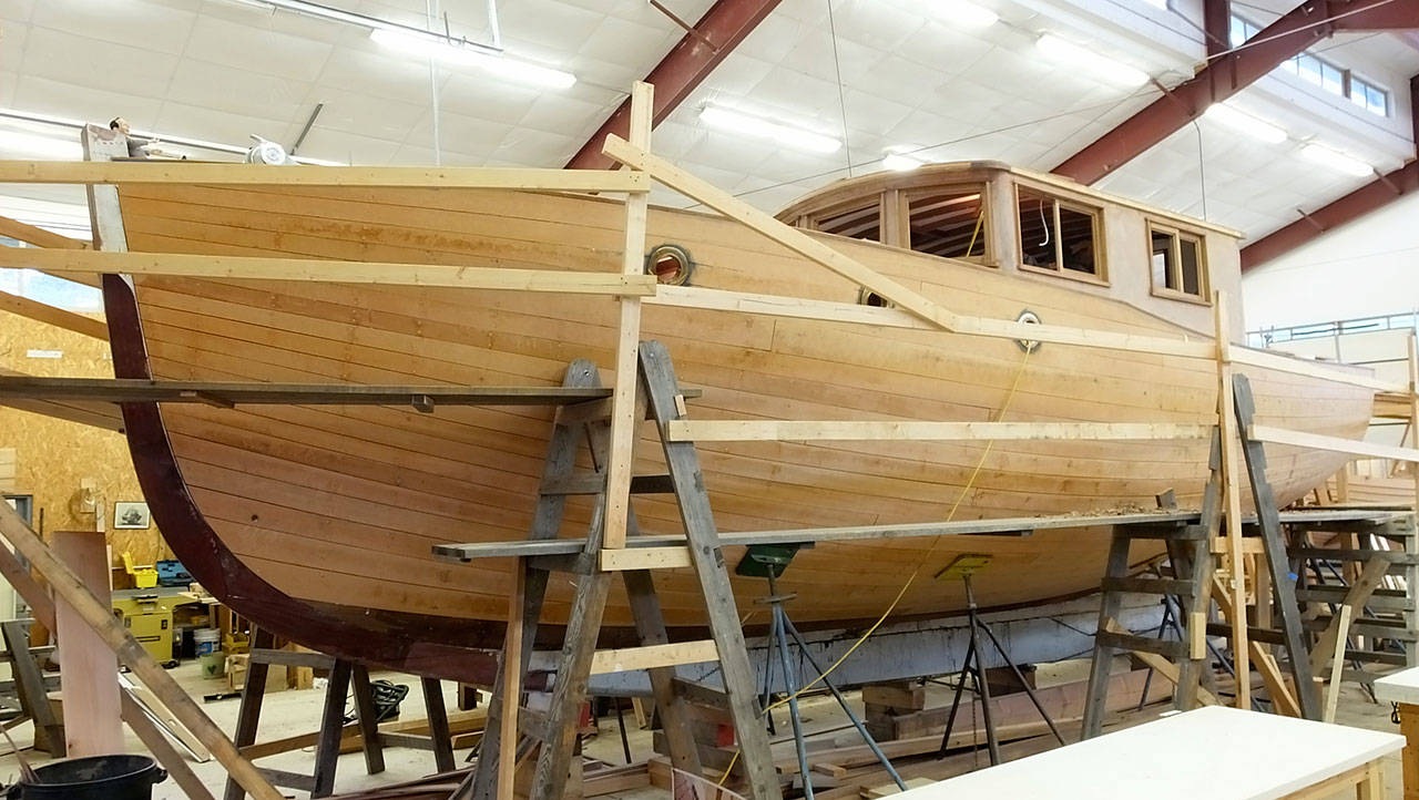The 36-foot Sea Beast, a motor sailor designed and built at the Northwest School of Wooden Boatbuilding with the help of students and local businesses, will hit the water for the first time Friday when it is lowered in the Boat Haven Marina. (Northwest School of Wooden Boatbuilding)