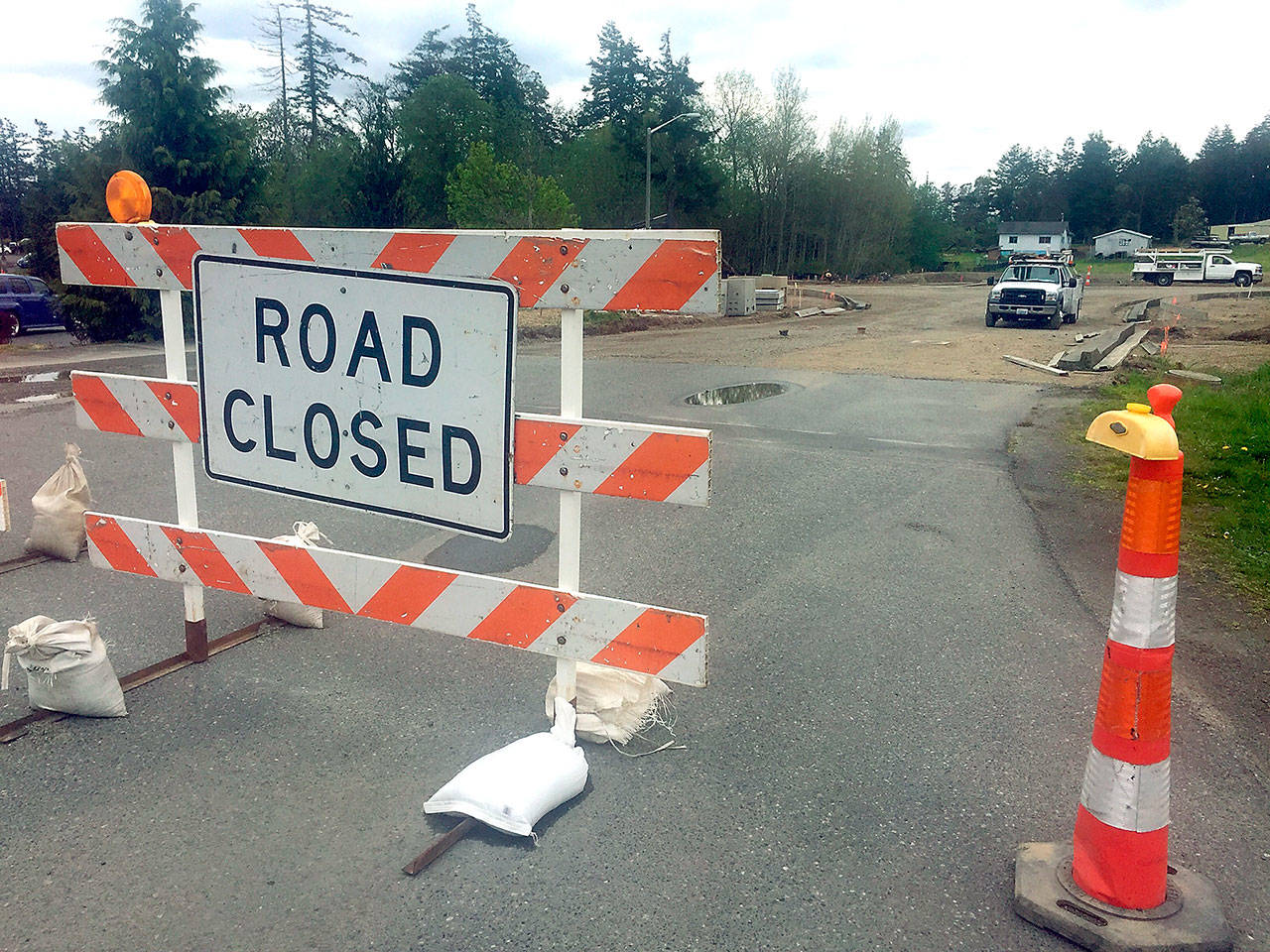Crews continue to work on the Howard Street extension, which was the first phase in creating the Howard Street and Upper Sims Way Subarea, an area the city hopes will host businesses and small-unit housing in the future. (Cydney McFarland/Peninsula Daily News)