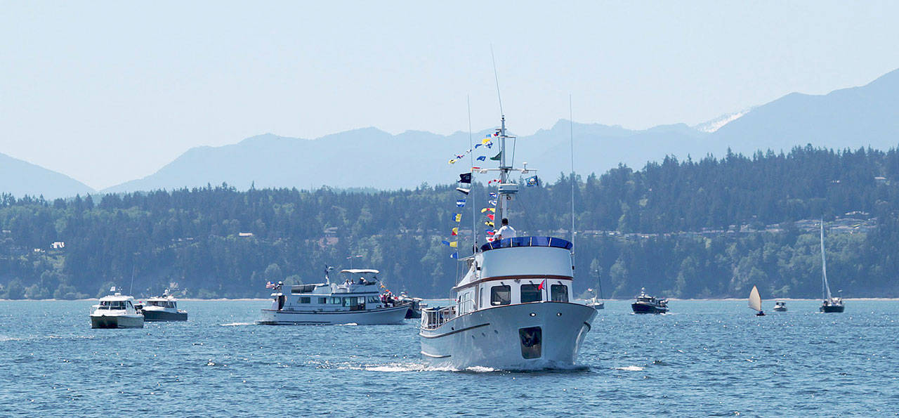 Boats of all shapes and sizes turned out last year for the annual boat parade, which kicks off the Port Townsend Yacht Club boating season. (Port Townsend Yacht Club)