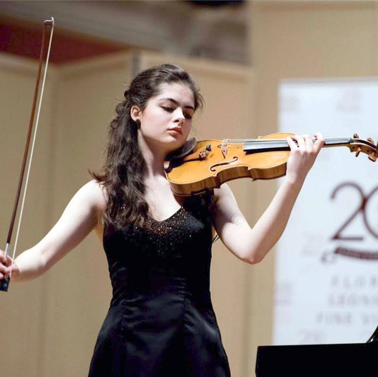 Teen violinist Marley Erickson will perform Mozart at two concerts this weekend.