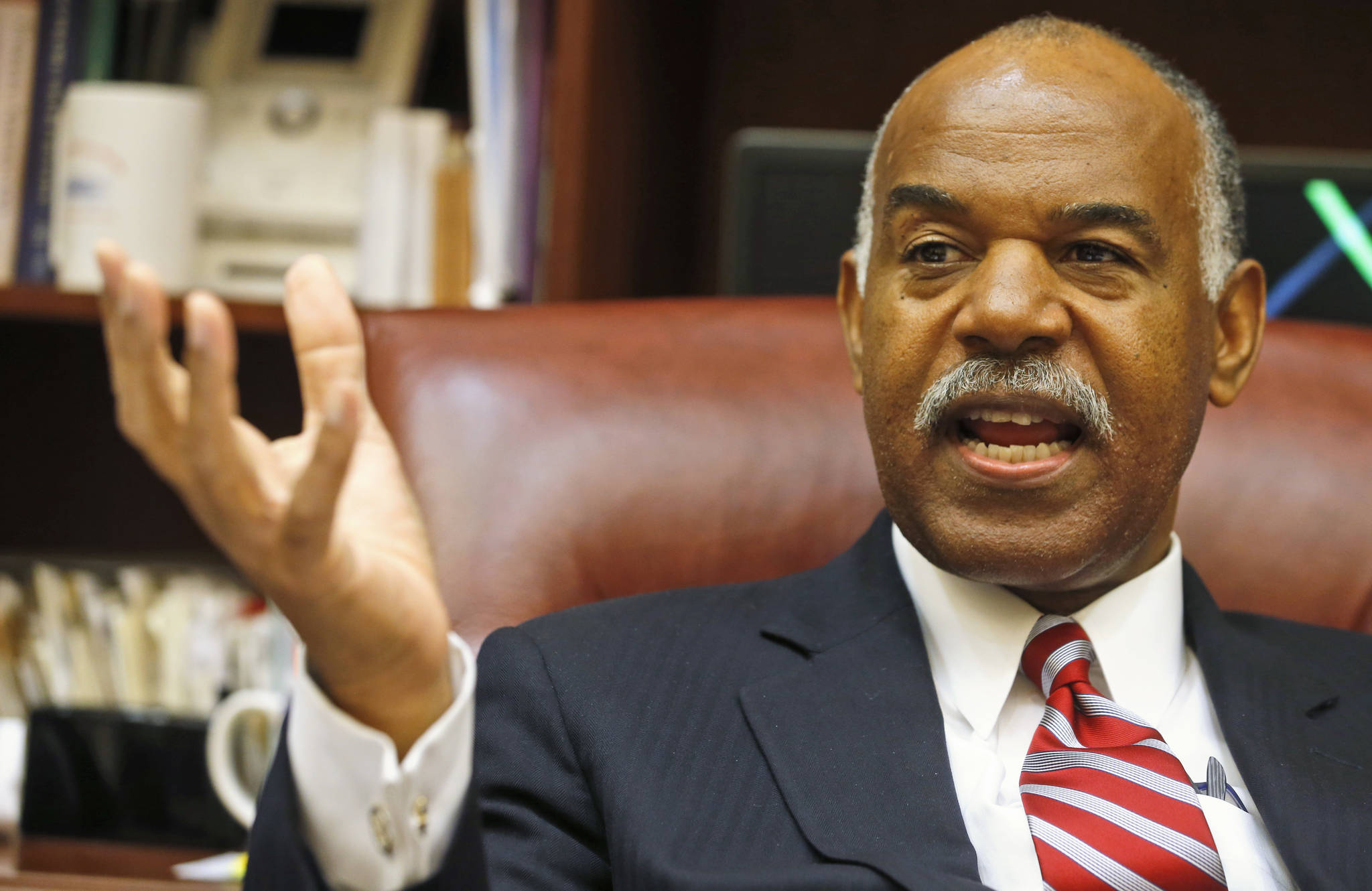 In this Sept. 27, 2016, photo, 4th Circuit Court of Appeals Chief Justice Roger Gregory gestures during an interview in his office in Richmond, Va. (Steve Helber/The Associated Press)