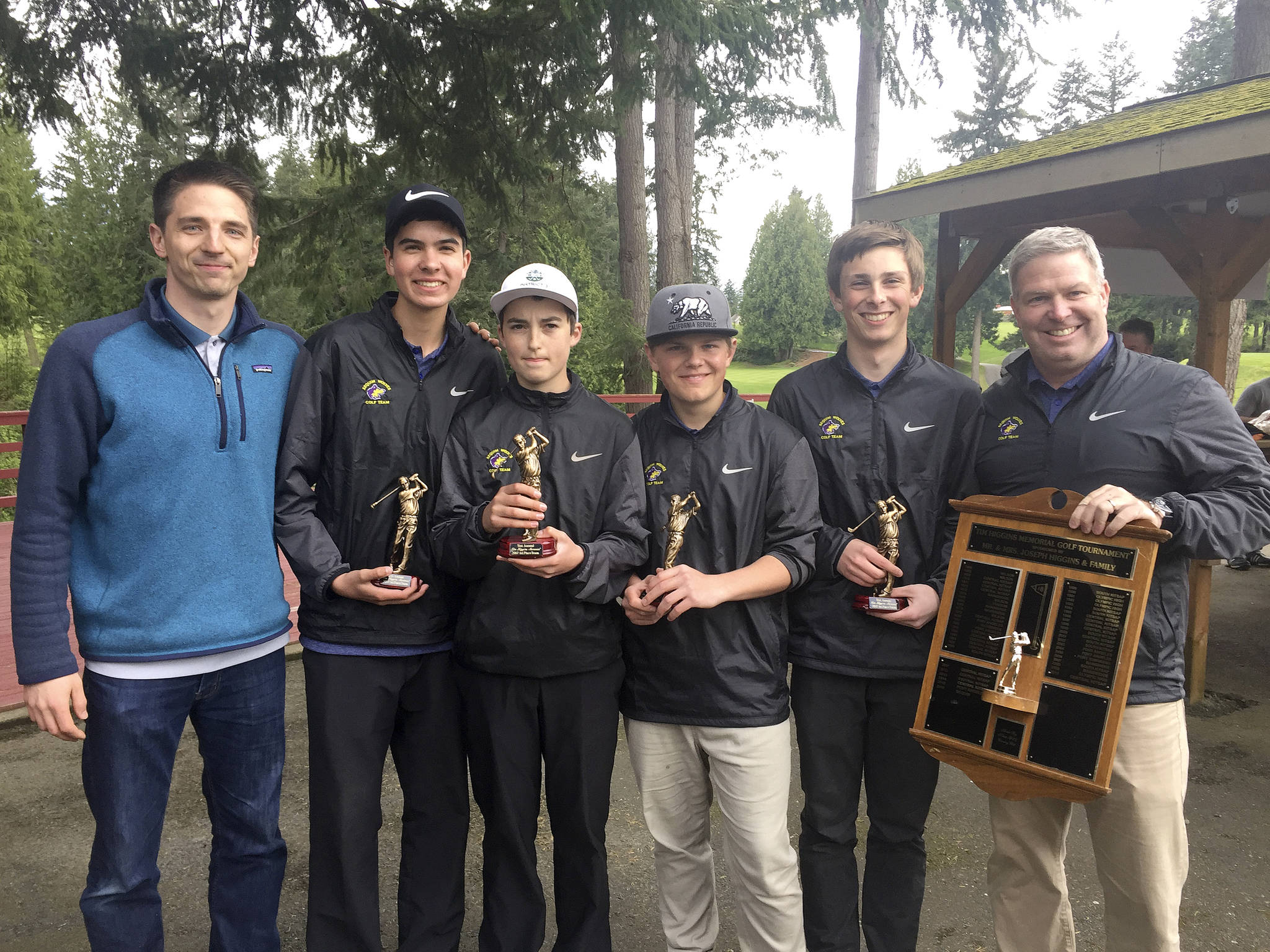 The Sequim High School boys golf team defended its title at the 51st annual Tim Higgins Memorial at Kitsap Golf and Country Club in Bremerton last week. The team also completed an undefeated Olympic League golf season and head to the postseason with a chance to qualify for the Class 2A state tournament. From left, to right, coach Sean O’Mera, Blake Wiker Paul Jacobsen, Andrew Vanderberg, Josiah Carter and head coach Bill Shea.