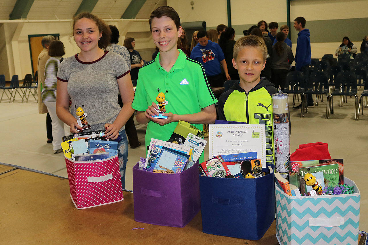 Winners of the Port Angeles All-City spelling bees are, from left, Emma Riffle, second place, middle school bee; James Burkhardt, first place, middle school bee; and Jacob Miller, first place, elementary bee. Not shown is Isaac Burnham, second-place elementary winner. (Port Angeles School District)