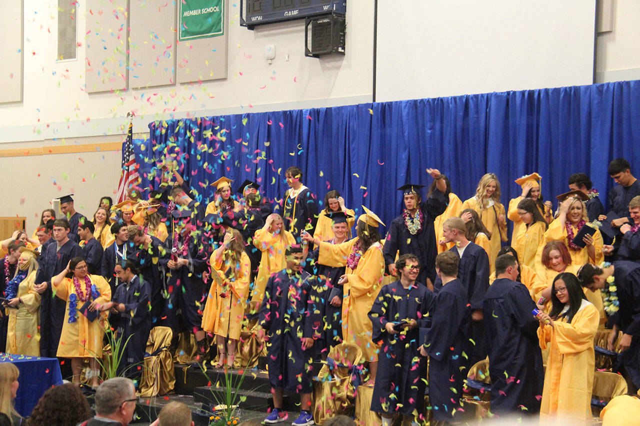 Members of the Forks High School class of 2017 celebrate Saturday night in the Spartan gymnasium in front of a packed house. (Christi Baron/Olympic Peninsula News Group)