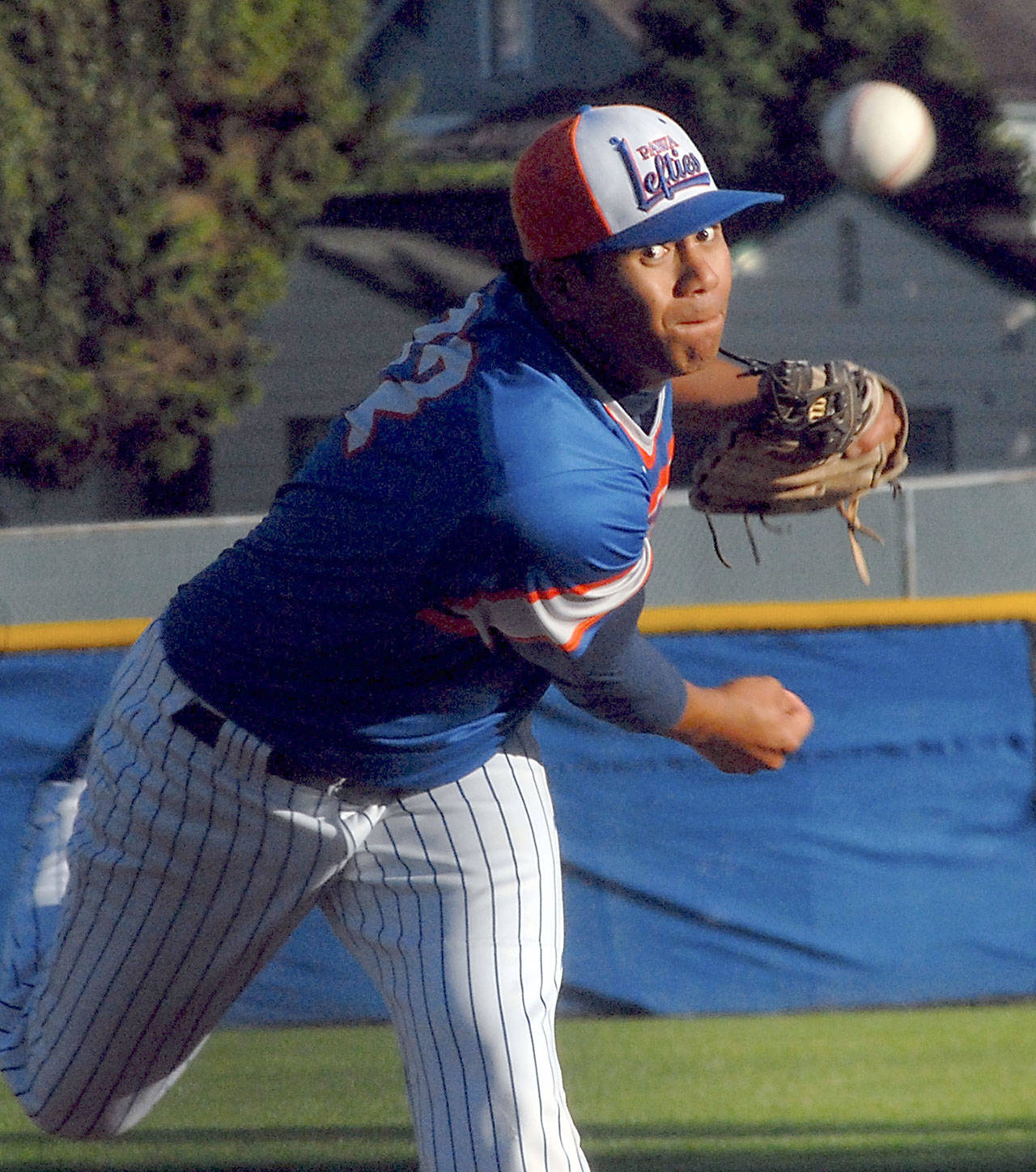 Keith Thorpe/Peninsula Daily News Mikey Hooper of the Lefties pitches in the fourth inning in their Thursday matchup against the Bend Elks at Port Angeles Civic Field.