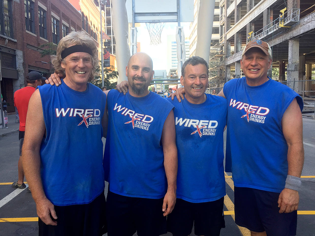 Better With Age won the championship of their 16-team bracket at Spokane’s Hoopfest, the largest 3 on 3 basketball tournament in the world. The team has won a championship at Hoopfest four out of the past five years. Team members are, from left, Joe Gladfelter, Chad Copeland, Jim Haguewood and Lane Richards.