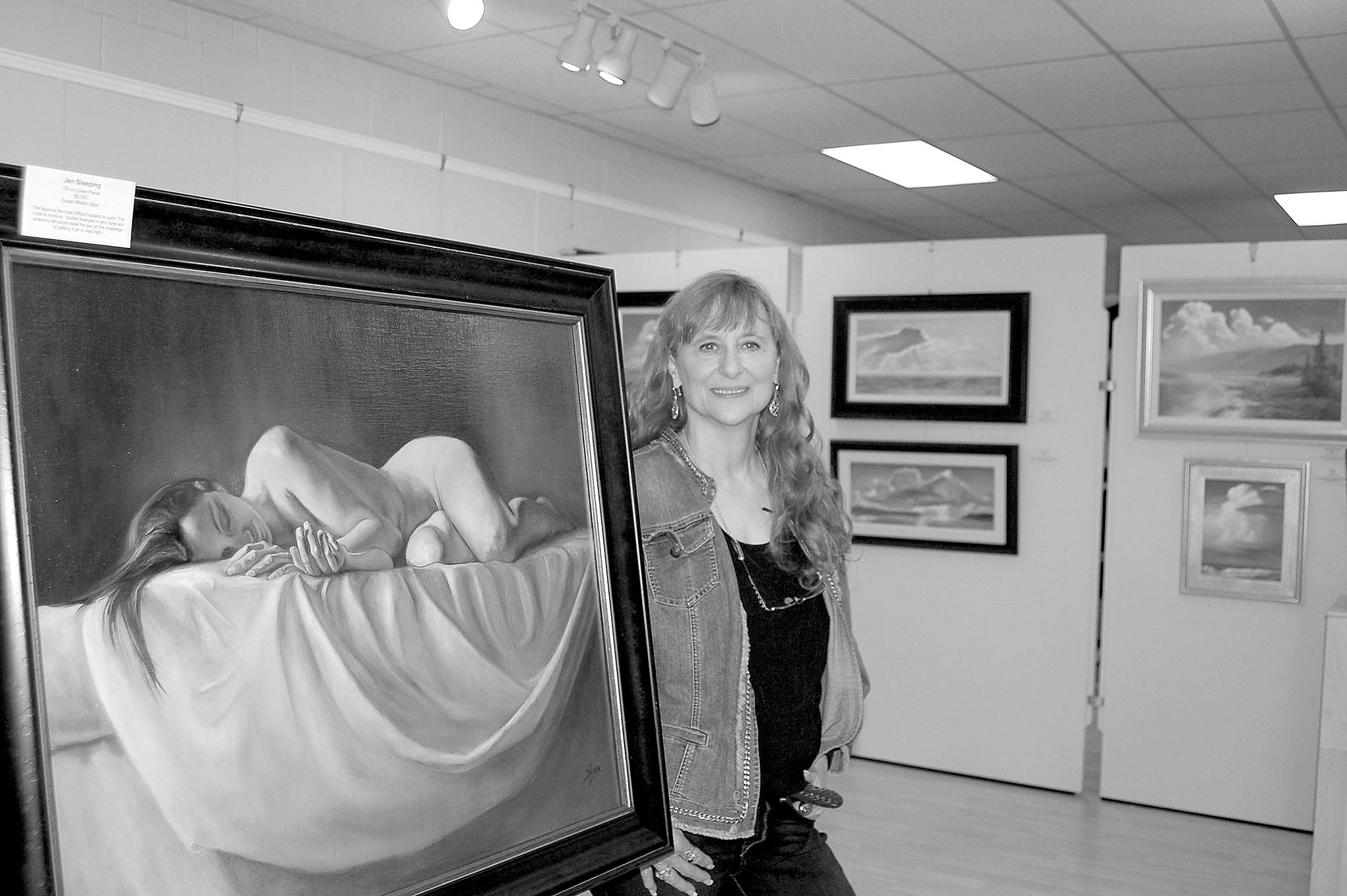 Erin Hawkins/Olympic Peninsula News Group                                Local artist Susan Spar stands next to her exhibit centerpiece, “Jen Sleeping,” on display at her show “People, Places & Things of the Heart” at the Sequim Museum & Arts Center. She will hold an artist demonstration and reception Saturday at the MAC.