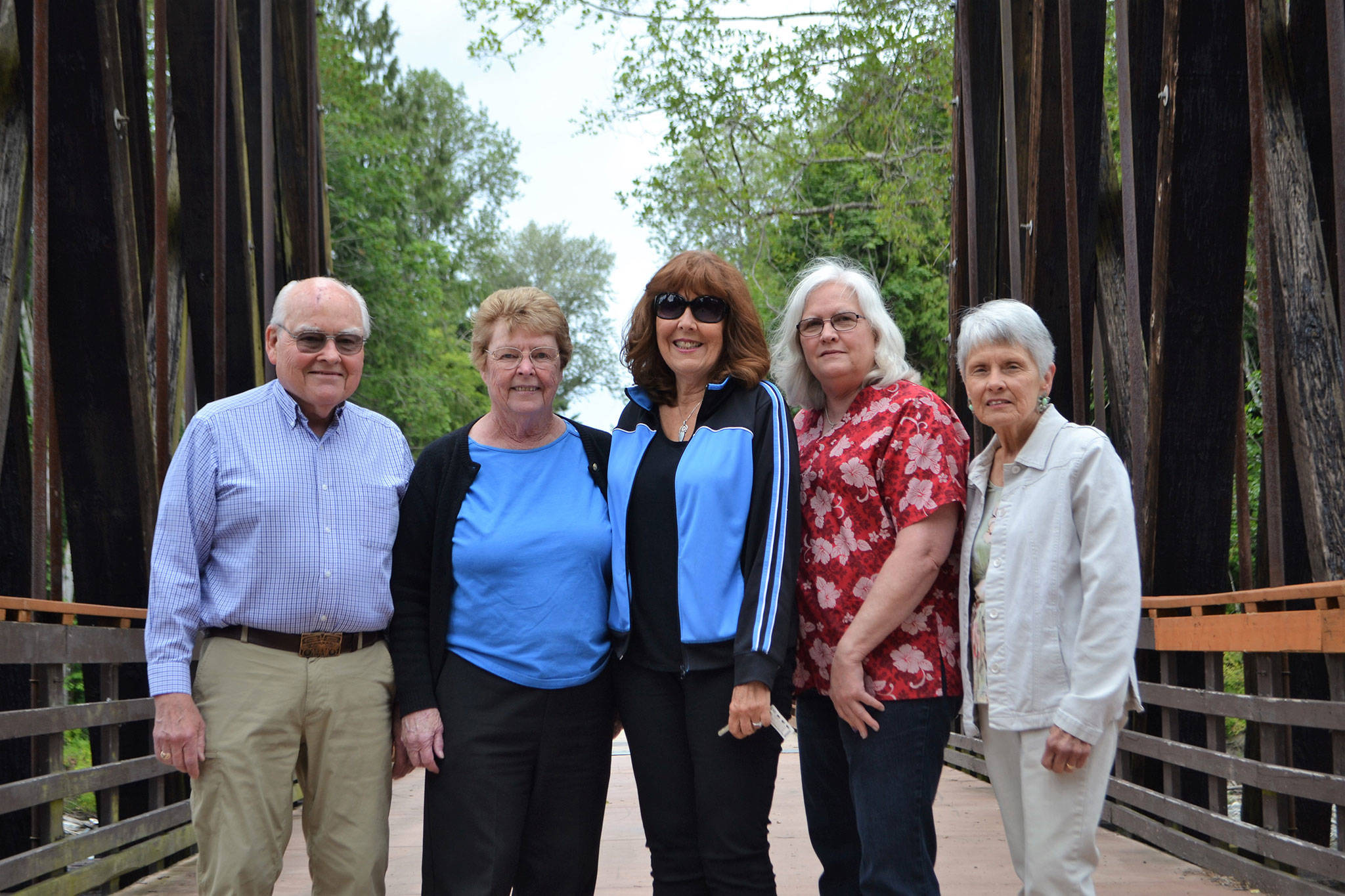 Board members of Sequim Community Aid include, from left, Jim Davis, president; Anne Notman, vice president; Kathy Suta, vice president of fundraising; Kathy Fong, treasurer; and Linda Alexander, recording secretary. The board says financial support is about half of its regular levels to provide help to those in need with utilities and rent. (Matthew Nash/Olympic Peninsula News Group)