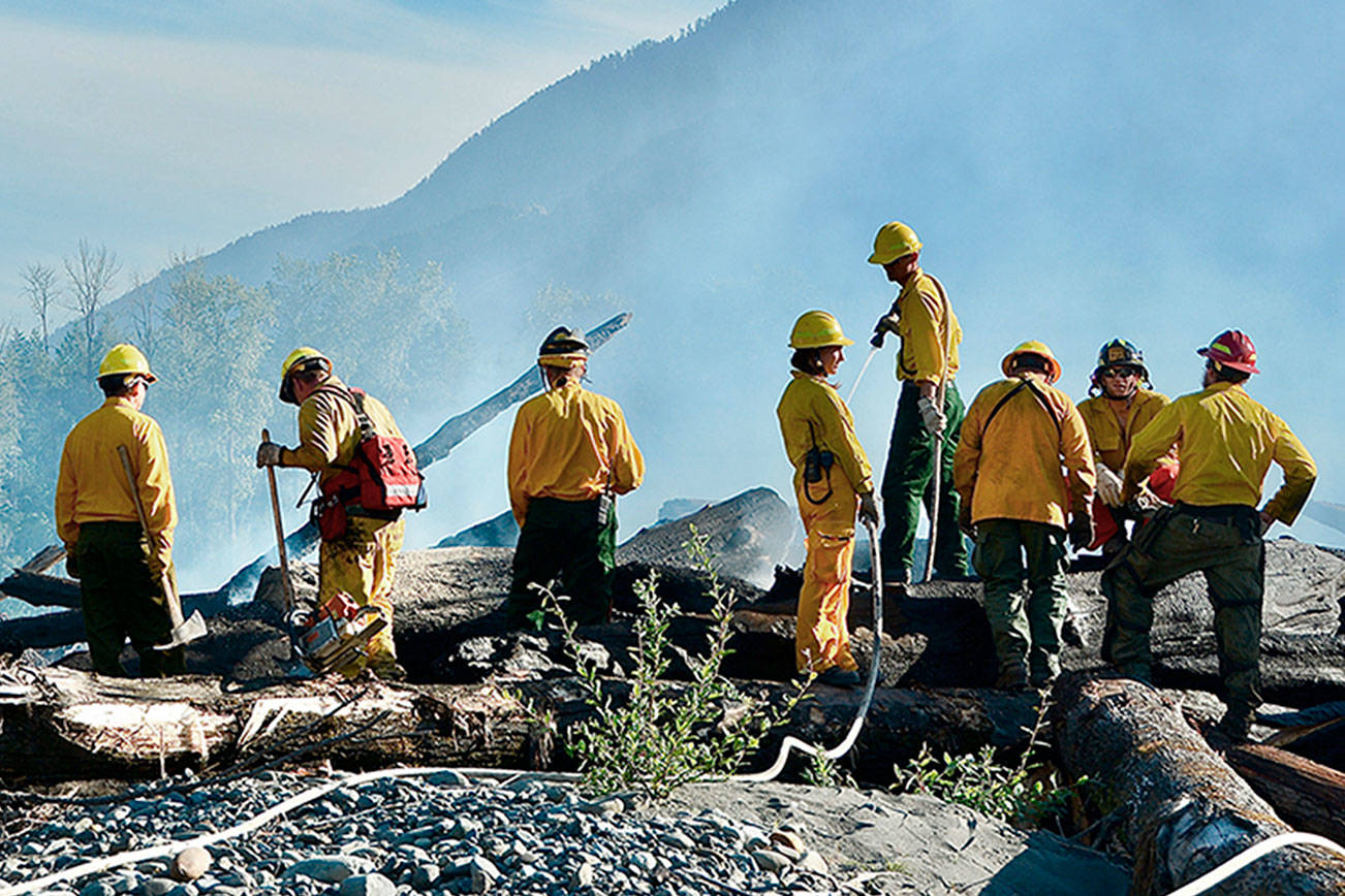 Brush fire, garage blaze keep Clallam firefighters busy