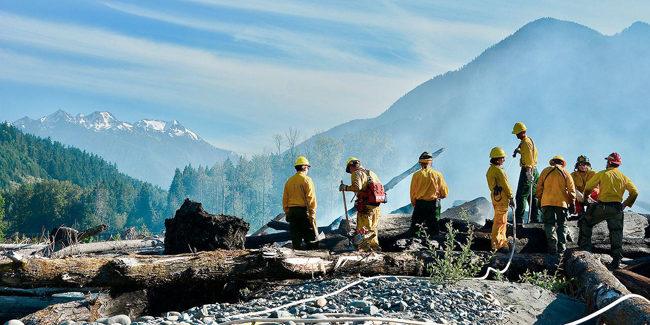 Firefighters from Clallam Fire District No. 2 responded to a logjam fire on the Elwha River on Friday evening. (Jay R. Cline/Clallam Fire District No. 2)