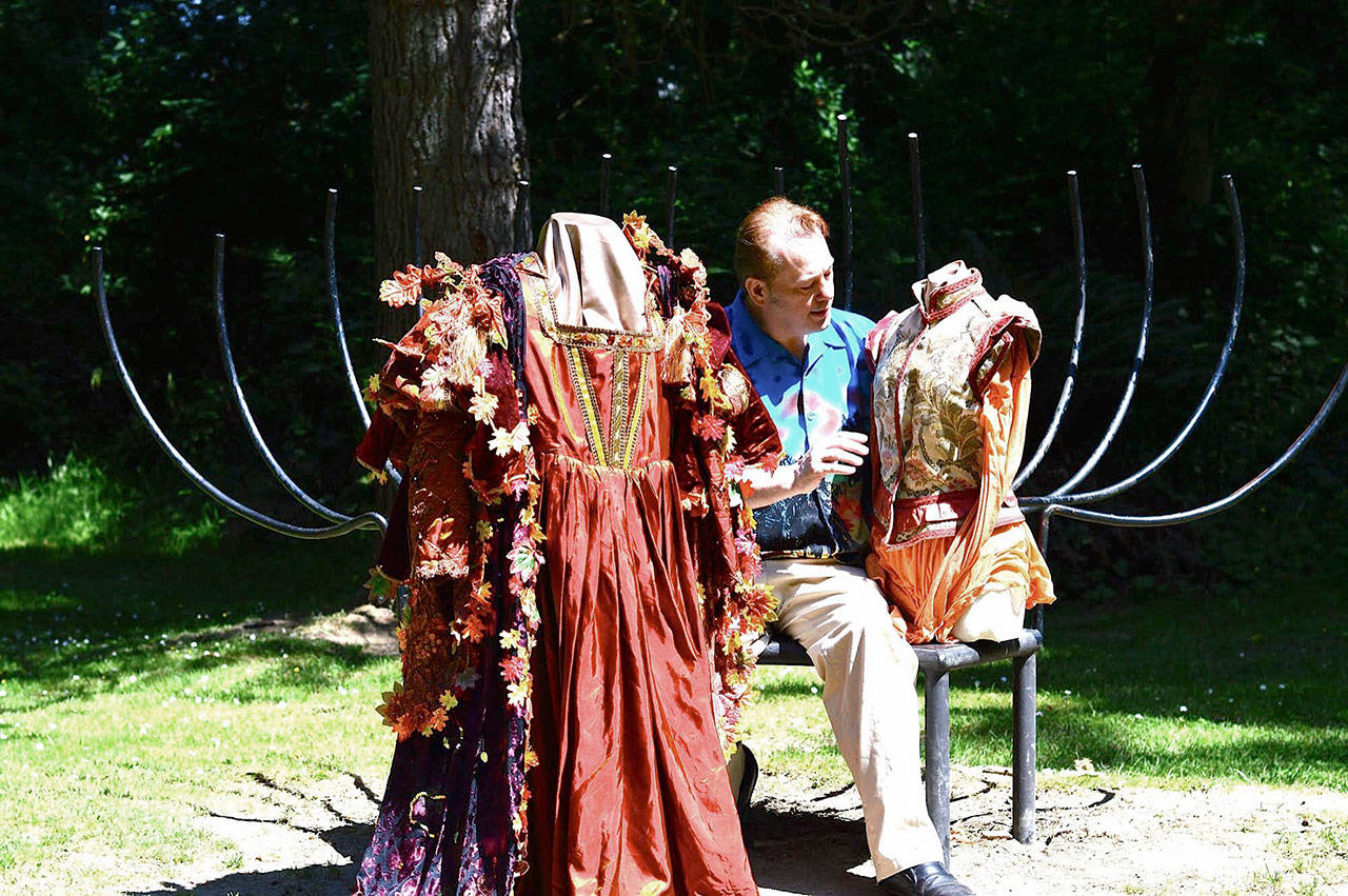 Diane Urbani de La Paz/for Peninsula Daily News Curator Richard Stephens brings costumes for Titania, of Shakespeare’s “A Midsummer Night’s Dream,” and an Italian youth to “Clothes Oft Proclaim the Man: Fashion and Passion in the Time of Shakespeare,” at the Port Angeles Fine Arts Center starting Saturday.