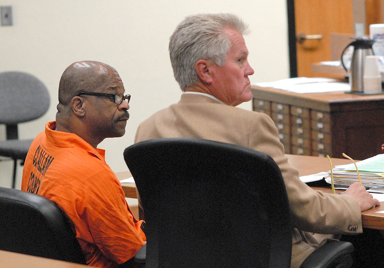 Tommy L. Ross Jr., left, who is a suspect in the April 24, 1978 murder of Janet Bowcutt in Port Angeles, sits with attorney Lane Wolfley in Clallam County Superior Court in Port Angeles on Tuesday. (Keith Thorpe/Peninsula Daily News)
