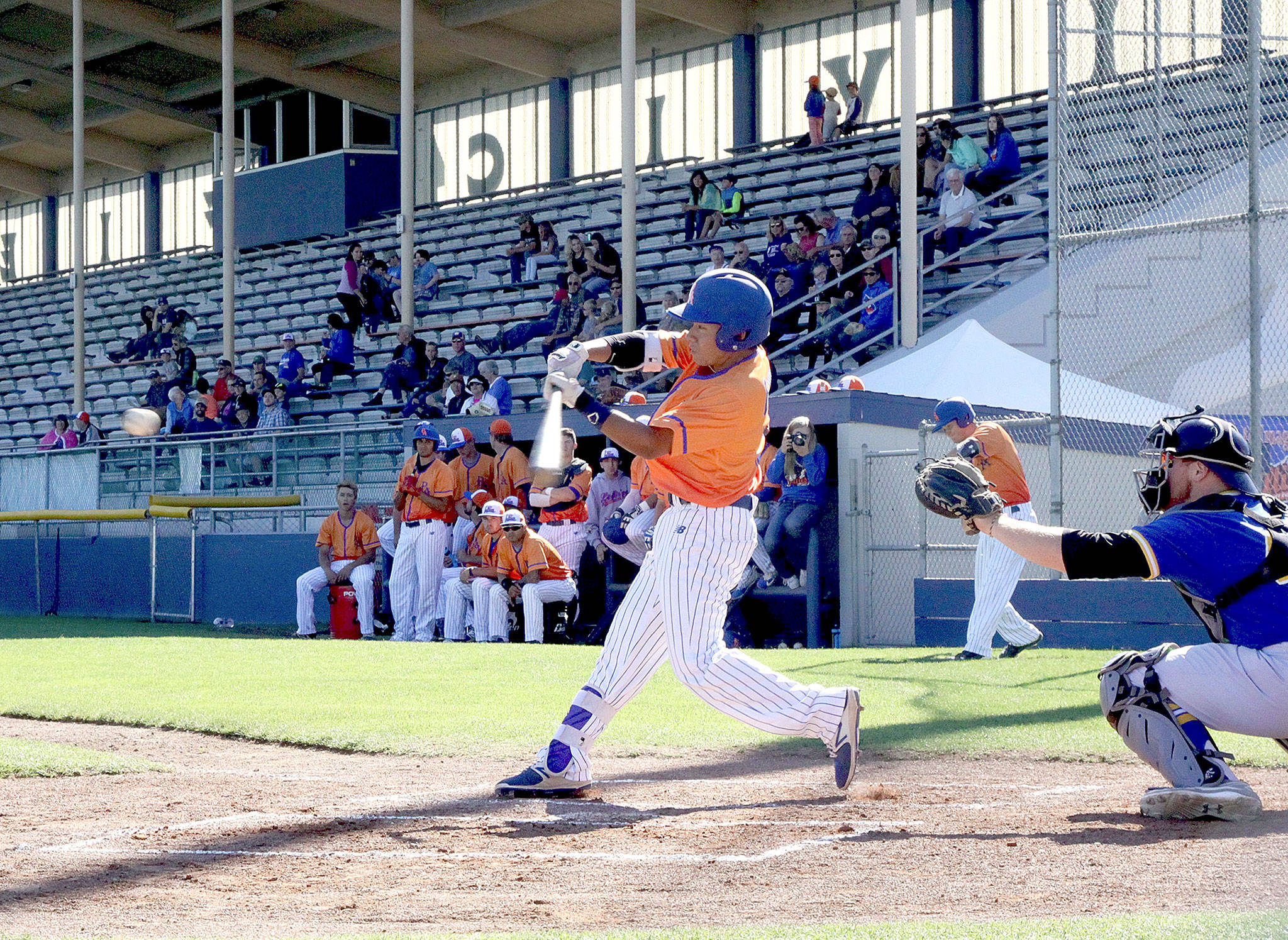 Dave Logan/for Peninsula Daily News Austyn Tengan of the Port Angeles Lefties swings against the Kitsap Bluejackets. The Lefties completed a two-game sweep against the Bluejackets on Sunday with a 6-4 win.