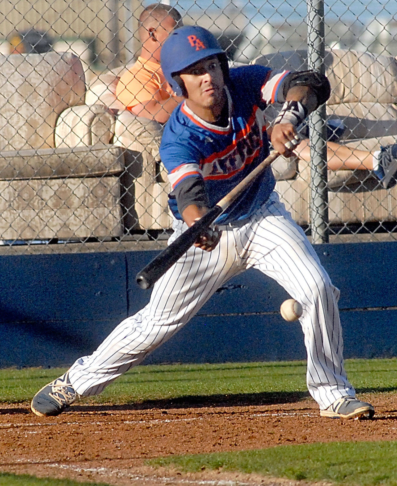Lefties’ catcher Brody Kato bunts in the third inning in a game against the Wenatchee Apple Sox at Civic Field in Port Angeles.                                Keith Thorpe/Peninsula Daily News