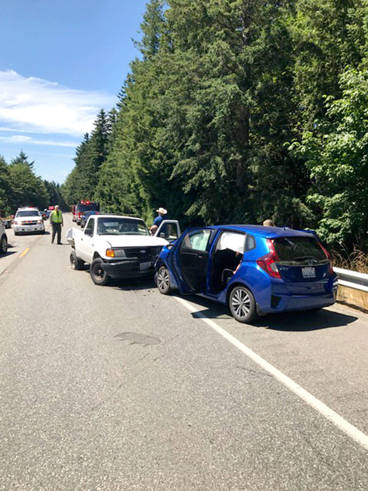 A chain-reaction wreck on state Highway 104 blocked the highway for nearly three hours and sent seven people to a hospital. (Port Ludlow Fire & Rescue)