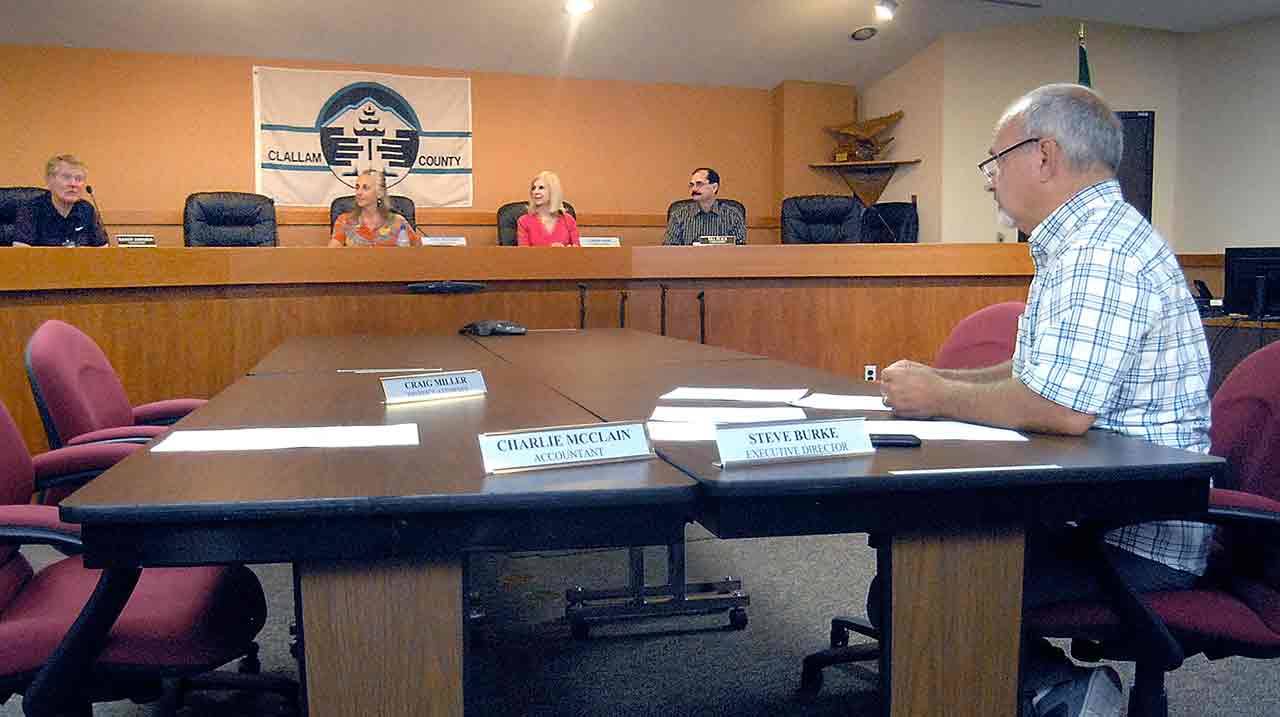 Steve Burke, executive director for the William Shore Memorial Pool, right, listens to the district’s board members, from left, Randy Johnson, Anna Manildi, Cherie Kidd and Bill Peach, after making a recommendation to request a levy increase to fund improvements to the pool. (Keith Thorpe/Peninsula Daily News)