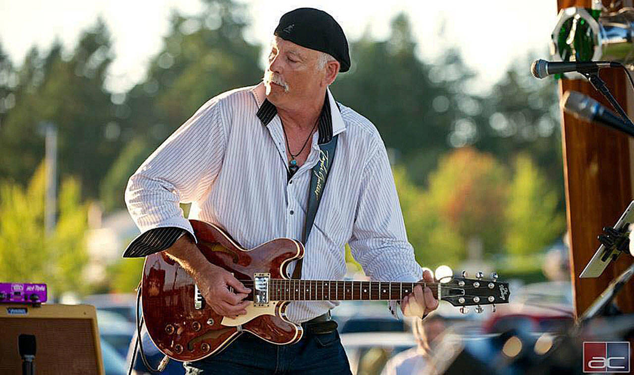 Guitarist-vocalist Rick Goudzwaard and the Blue Rhinos will visit the Sequim Library for a concert tonight.