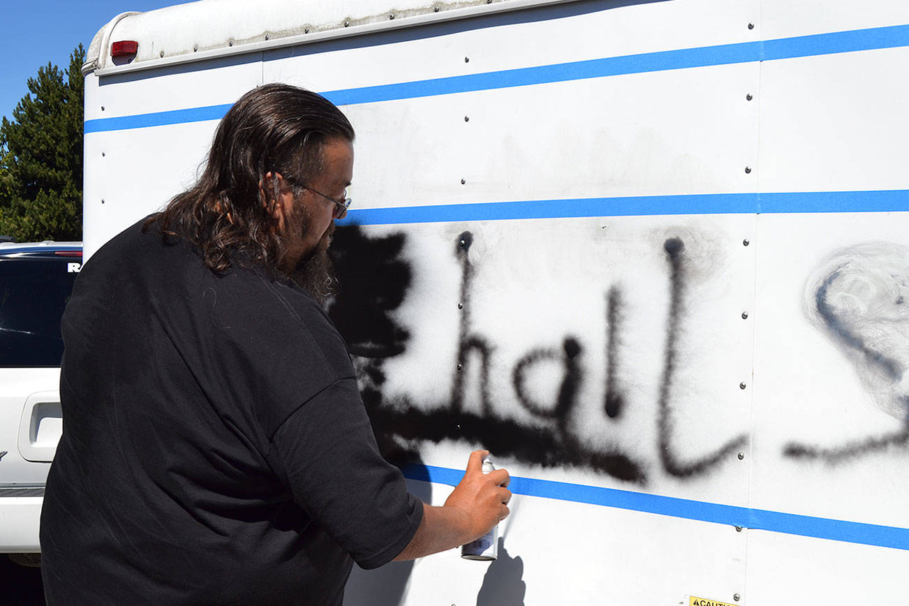 Vandals spray-paint Sequim church’s door and trailer