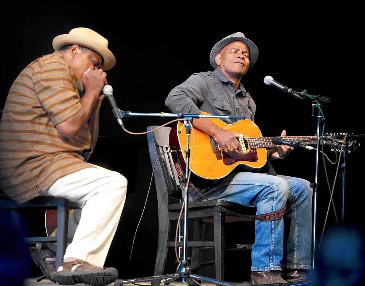 Roz Powell                                Phil Wiggins, left, plays the harmonica at Centrum’s 2016 Acoustic Blues Festival.