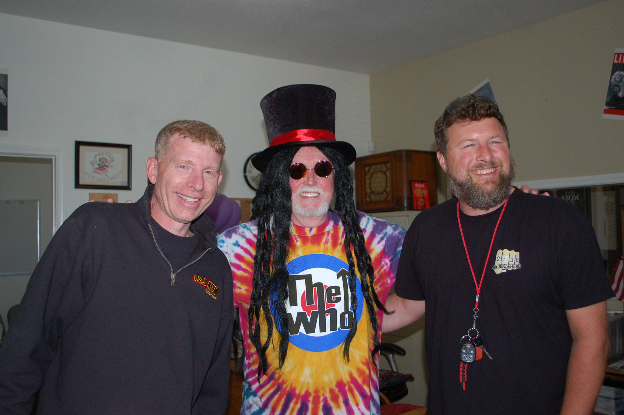 Left, John Reynolds, George Dooley dressed as “Dr. D.” and Brad Cash stand together after a live broadcast discussed the Streett family and how listeners can help support the family after a car accident in Colorado took the lives of two family members. (Erin Hawkins/Olympic Peninsula News Group)