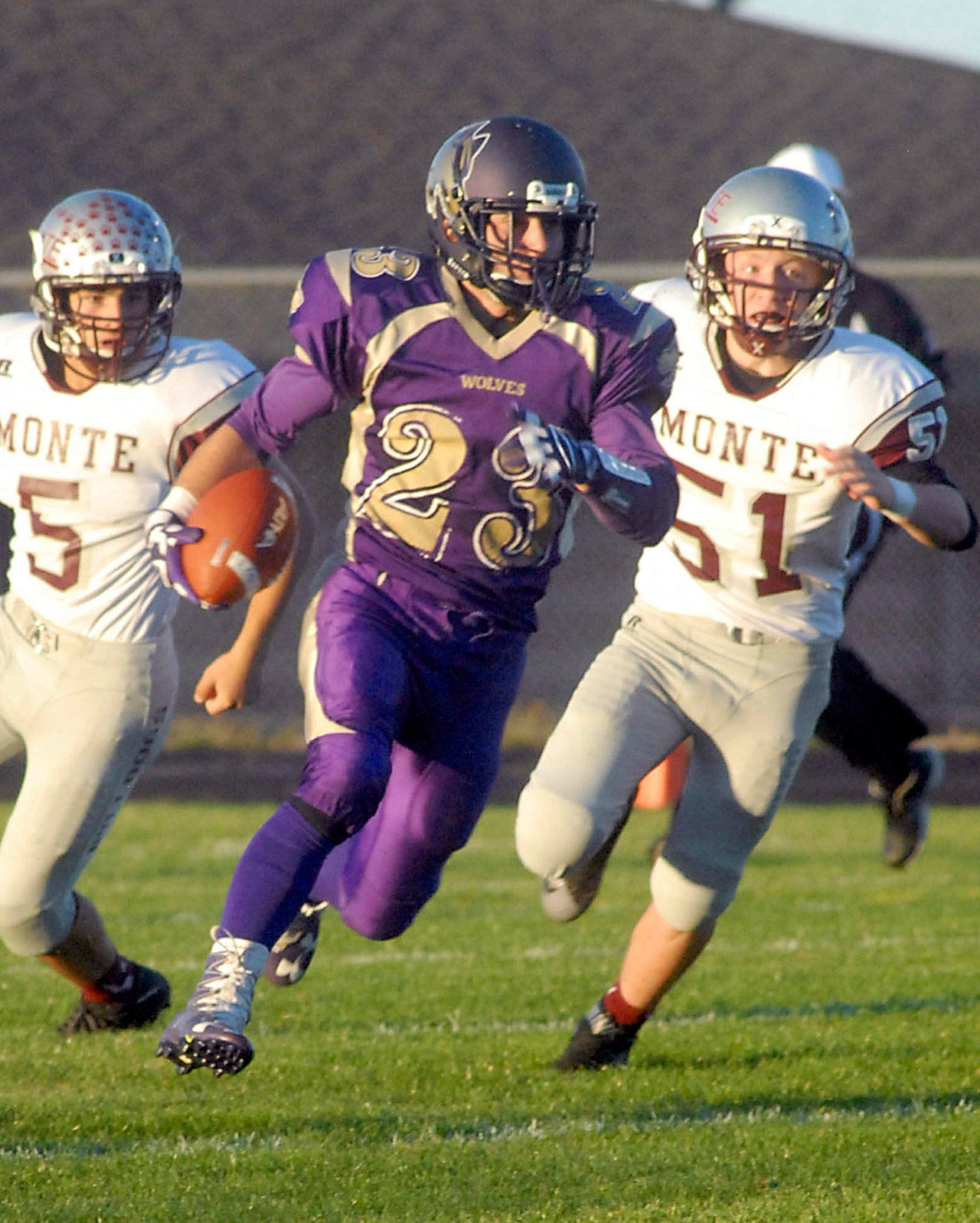 Gavin Velarde of Sequim takes the opening kickoff for a touchdown against Montesano last season. Keith Thorpe/Peninsula Daily News