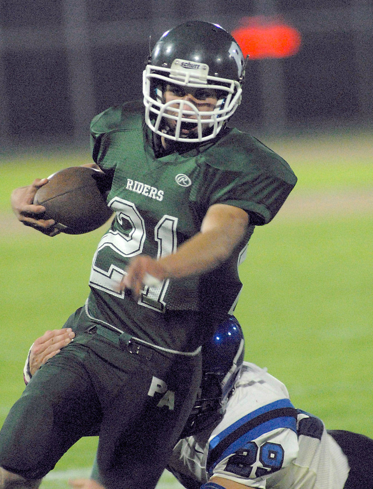 Jarrett Burns of Port Angeles rushes in a September 2016 matchup against North Mason. Keith Thorpe/Peninsula Daily News