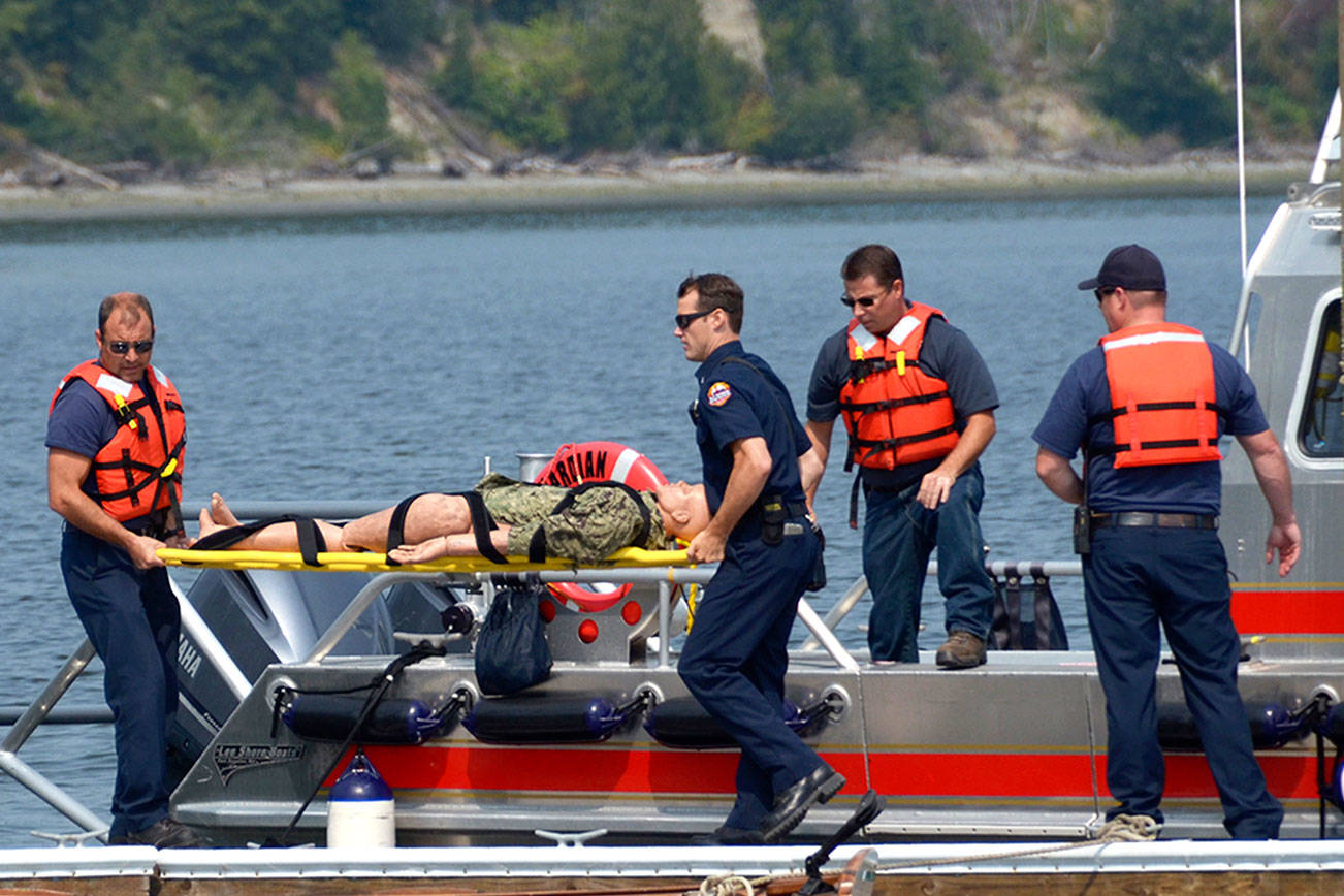Emergency responders, volunteers practice with sea plane
