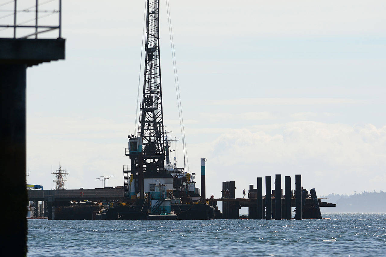 The deck for the Navy’s submarine escort pier at the Coast Guard base on Ediz Hook has been completed. (Jesse Major/Peninsula Daily News)