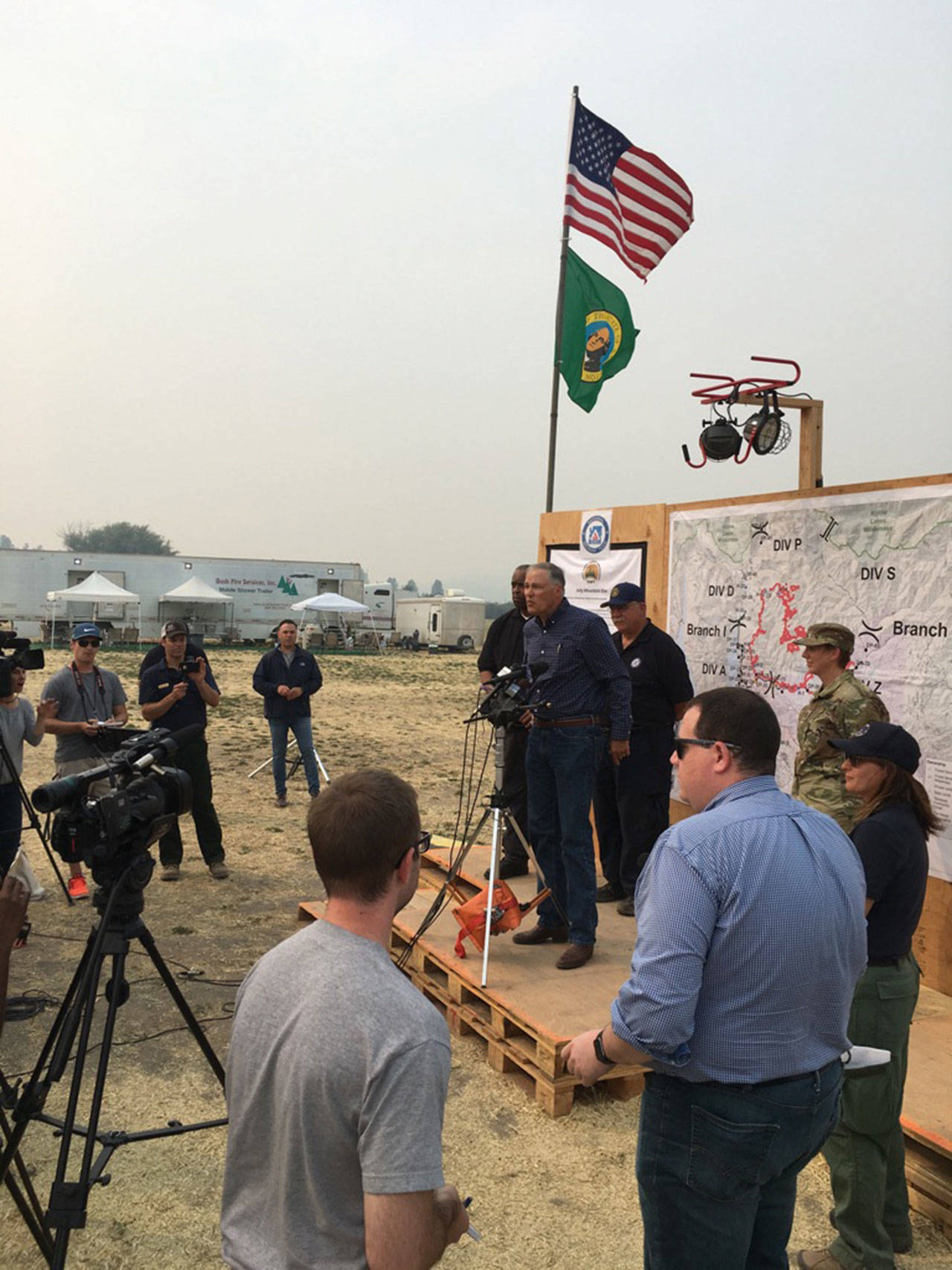 Gov. Jay Inslee addresses firefighters working against the Jolly Mountain Fire near Cle Elum on Sept. 5.
