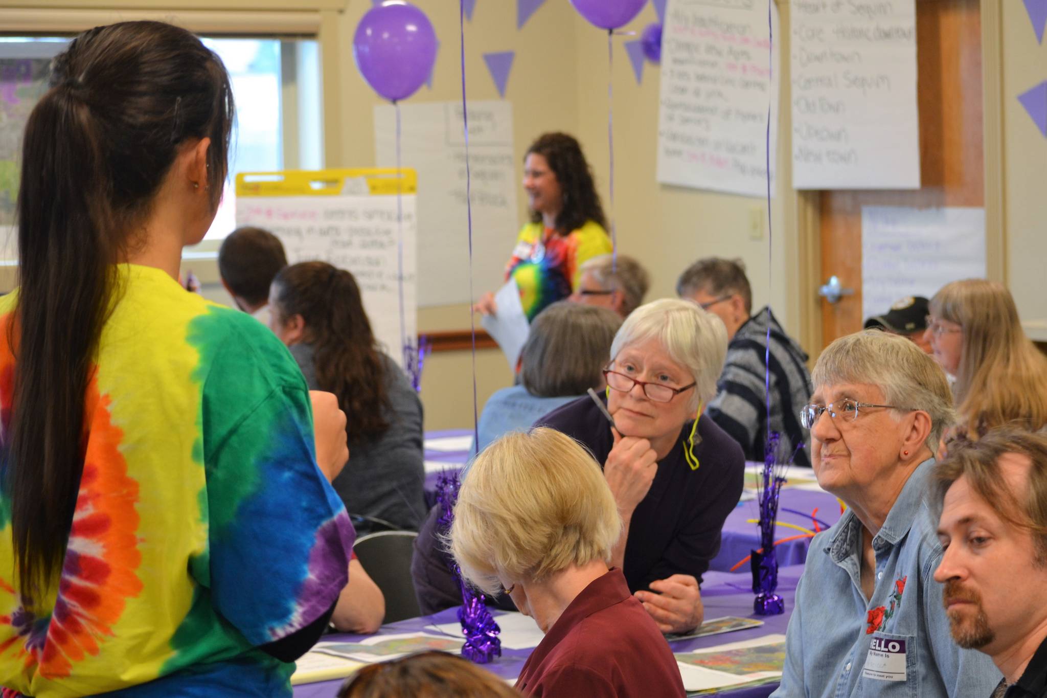 Sharon Quesnell and Priscilla Hudson listen in on a discussion about downtown Sequim at the city of Sequim’s Neighborhood Visioning Meeting in the Guy Cole Convention Center last Saturday. Quesnell said city staff “have done a good job of getting people involved.” (Matthew Nash/Olympic Peninsula News Group)
