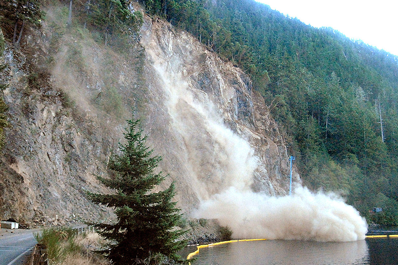 Boulders bounce off highway into lake as workers clear cliff on U.S. 101