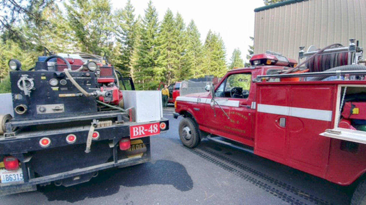 Firefighters Tyler Reid and Jessica Adams have returned safely to Port Angeles after spending one week working at the Jolly Mountain Fire.