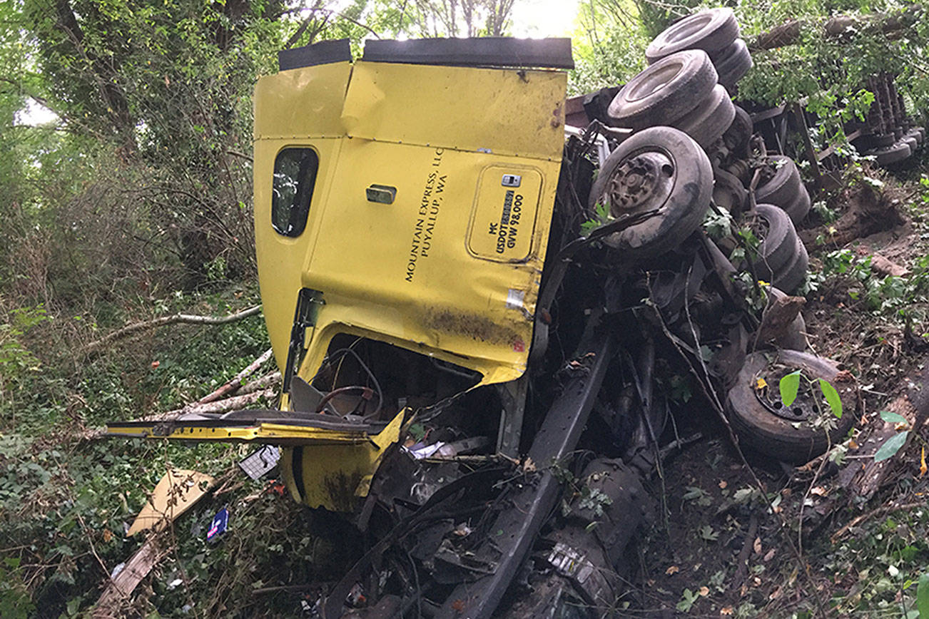 Two hurt in wreck involving semitruck, car on Highway 104 near Shine Road