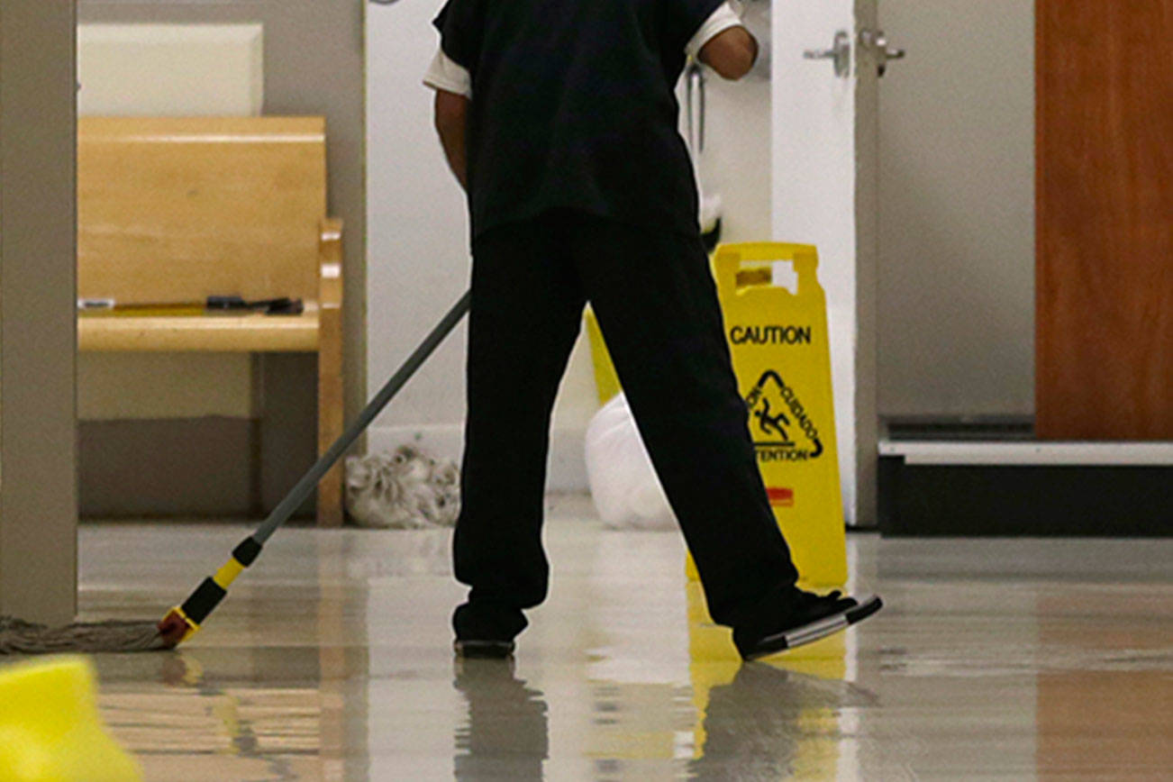 Detention center sued for paying detainees $1 a day