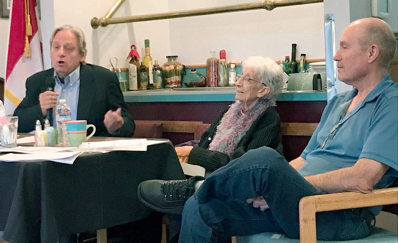 Dr. Tom Locke answers a question at a forum on fluoridation Tuesday as part of a panel that included retired Dr. Eloise Kailin and Port Angeles resident Jim Bourget. (Paul Gottlieb/Peninsula Daily News)