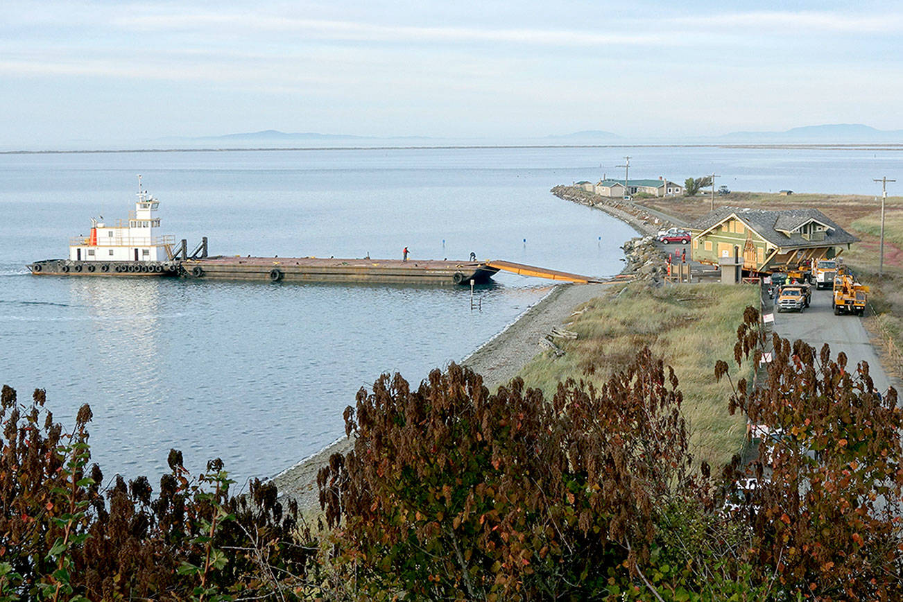 Couple brings house to Sequim from Shelton via barge