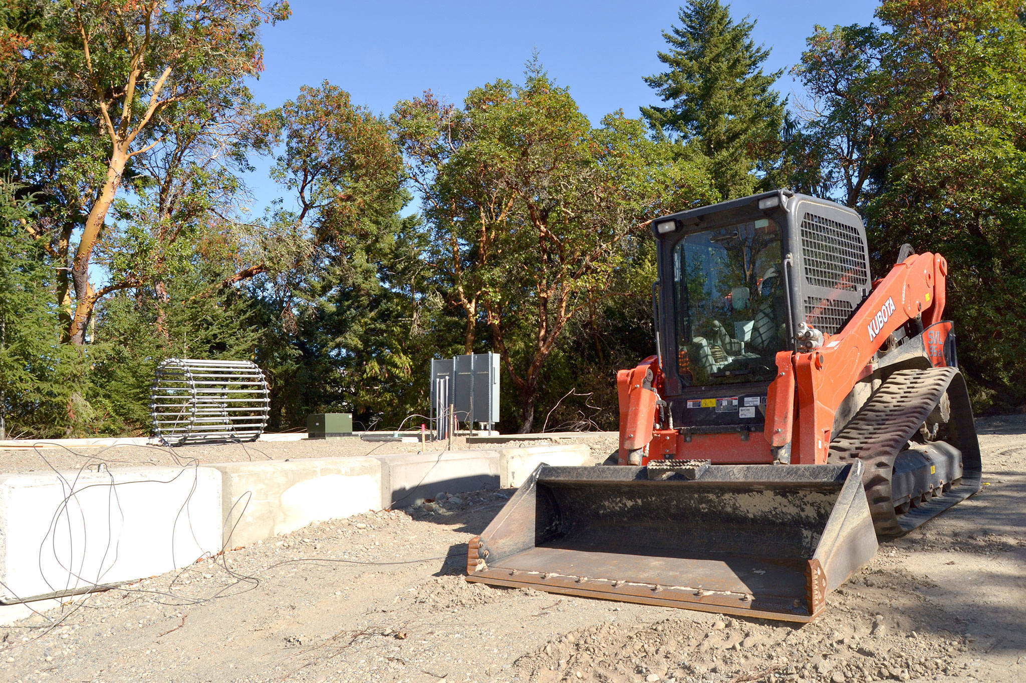 Construction continues on a radio-cell tower on Brigadoon Boulevard in Sequim that is anticipated to be upright by November. A wireless company plans to begin increasing its coverage area through it as soon as December, developers said. (Matthew Nash/ Olympic Peninsula News Group)
