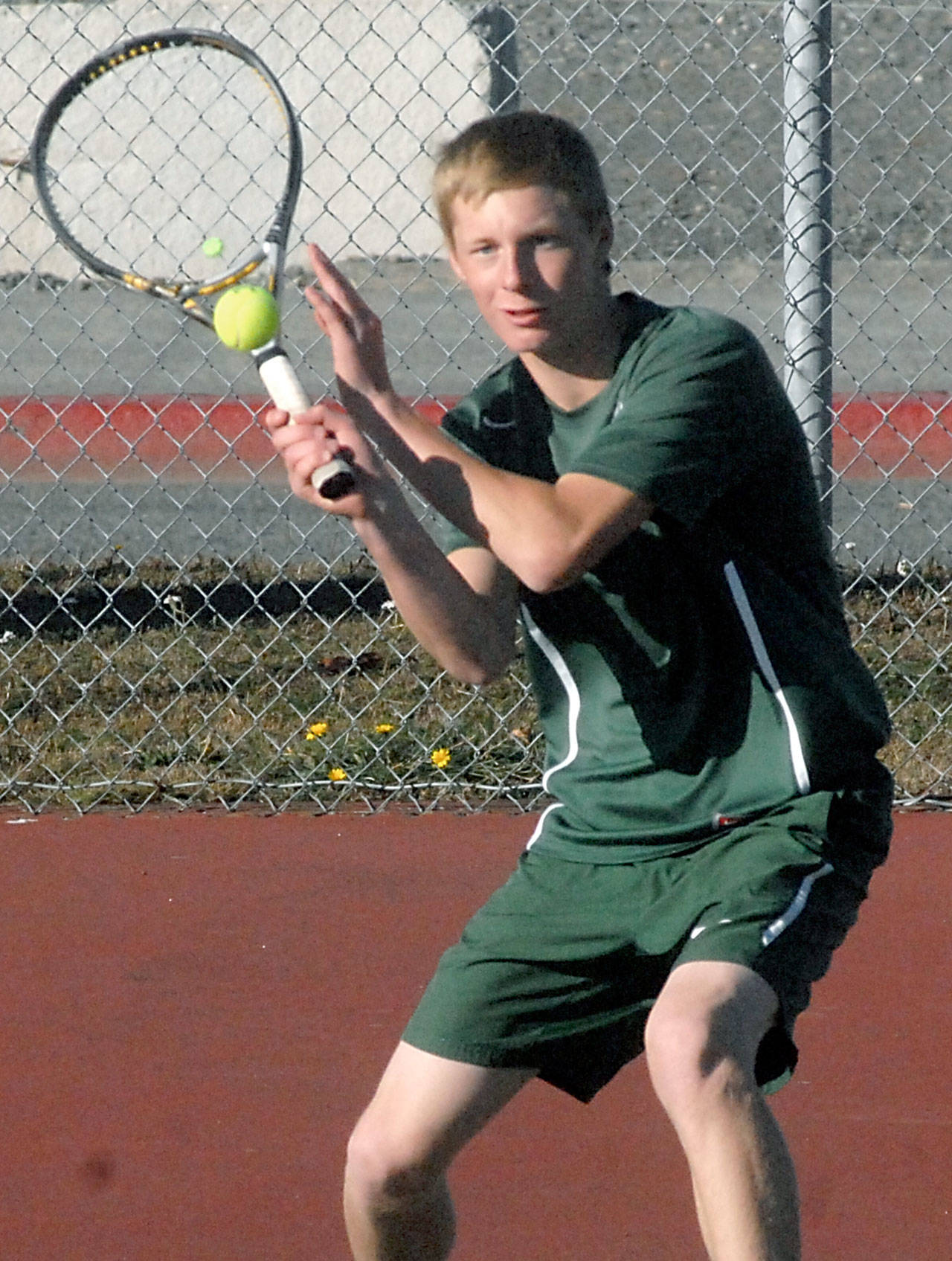 Port Angeles’ Hayden Woods has racked up a 13-0 record in singles matches this season entering the first day of the Class 2A Olympic League Tennis Tournament today in Bremerton. Keith Thorpe/Peninsula Daily News