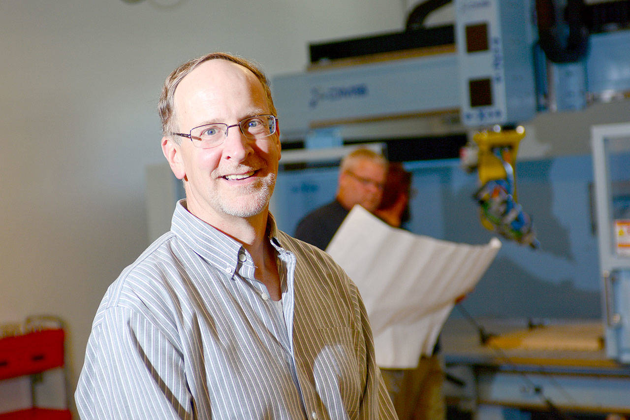 Dave Walter, CEO of the Composite Recycling Technology Center, told the Port of Port Angeles and Clallam County commissioners Monday that the CRTC is focused on the launch of three products in the coming months. (Jesse Major/Peninsula Daily News)