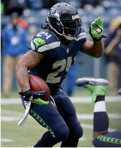 Seattle Seahawks' Marshawn Lynch (24) runs against the Green Bay Packers during the second half of the NFL football NFC Championship game on Sunday. (The Associated Press (Click on photo to enlarge))