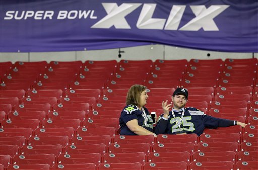 Seattle Seahawks fans sit in the stands after the NFL Super Bowl XLIX football game between the Seattle Seahawks and the New England Patriots in Glendale