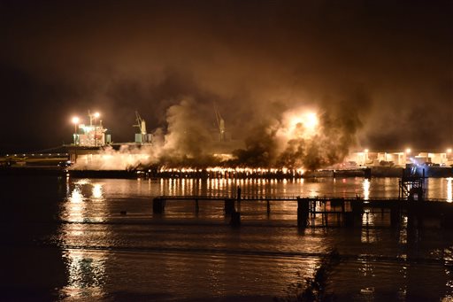 A significant amount of dark and smelly smoke from a fire at a deepwater port terminal billows over the town of Squamish