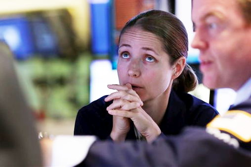 Amanda Anderson pauses while working on the floor of the New York Stock Exchange on Tuesday. The Associated Press