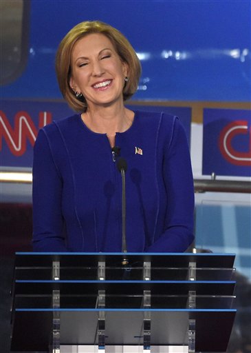 Republican presidential candidate Carly Fiorina laughs during the CNN Republican presidential debate at the Ronald Reagan Presidential Library and Museum on Wednesday. The Associated Press
