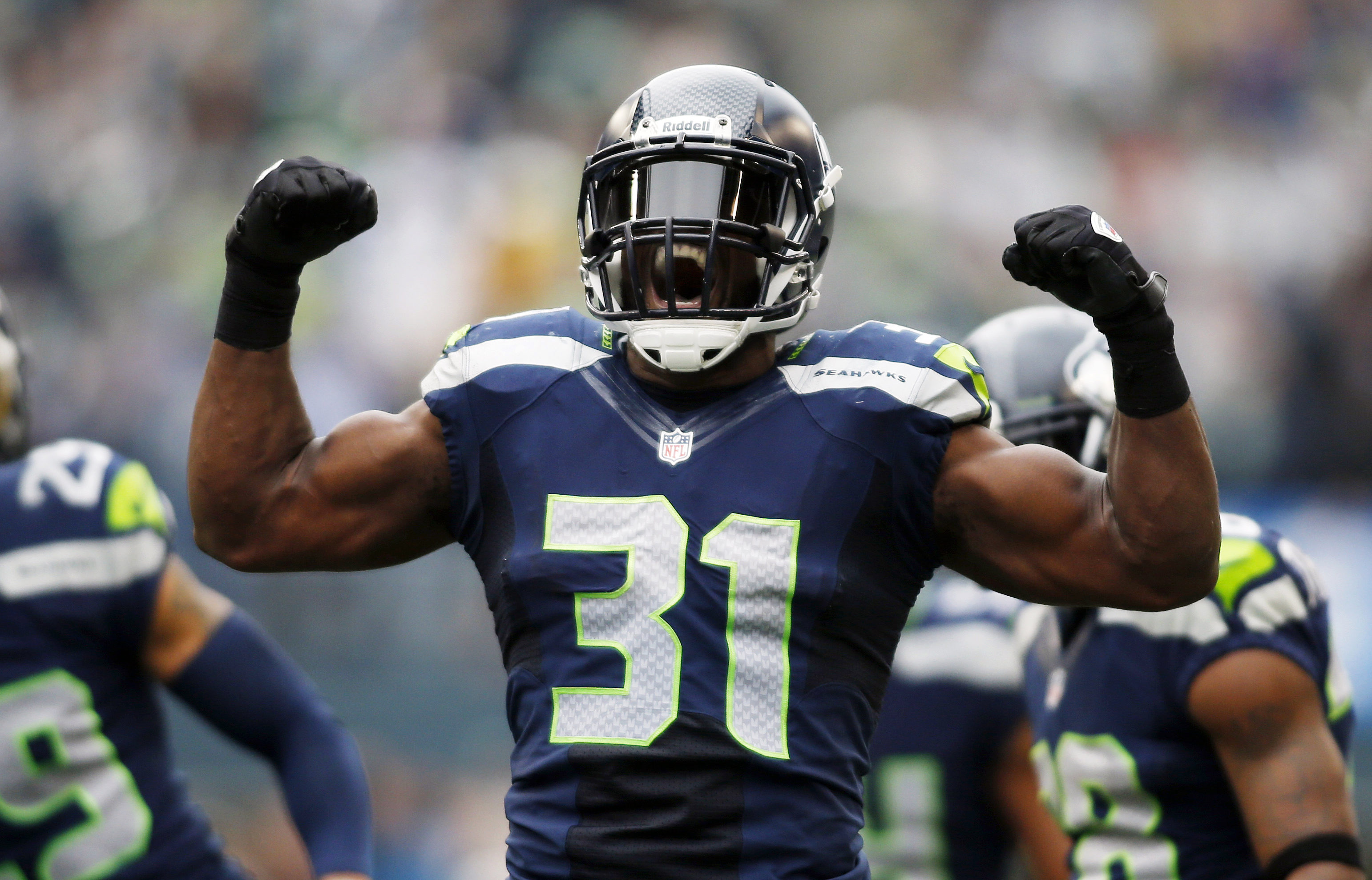 Seahawks safety Kam Chancellor ended his holdout and reported to the team Wednesday. John Froschauer/The Associated Press