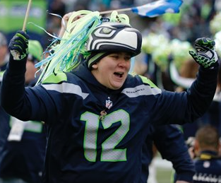 To inspire you — Seattle Seahawks fan on the field as a part of a "12th man" salute before the Dec. 28 game with the St. Louis Rams in Seattle (The Associated Press)