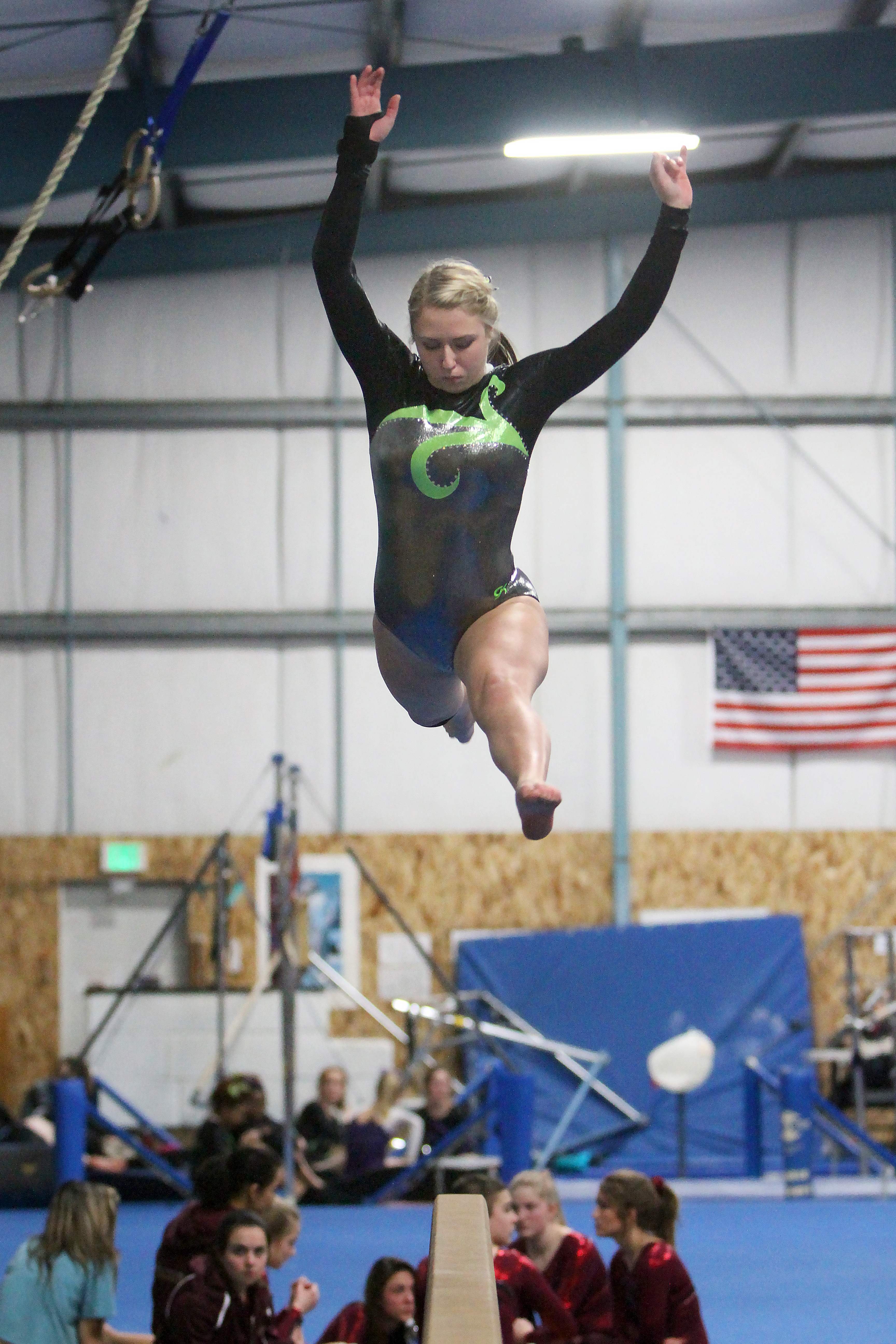 Port Angeles High School senior Elizabeth DeFrang performs on the balance beam Monday afternoon at Klahhane Gymnastics Center in Port Angeles. Monday's meet was the lone home contest for the Roughriders this season. (Daniel Horton/for Peninsula Daily News)