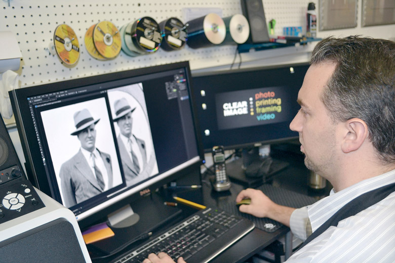 Clear Image Photo & Framing owner Daniel Jolly is asking area residents to help him finish strong in a national Small Business Contest hosted by Microsoft by voting for his company online. (Matthew Nash)